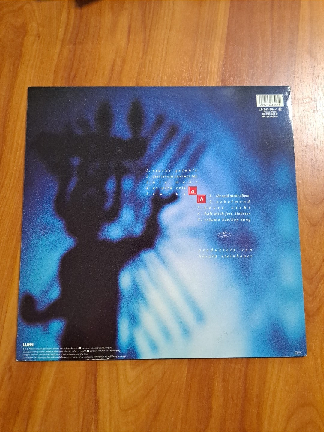 7754565